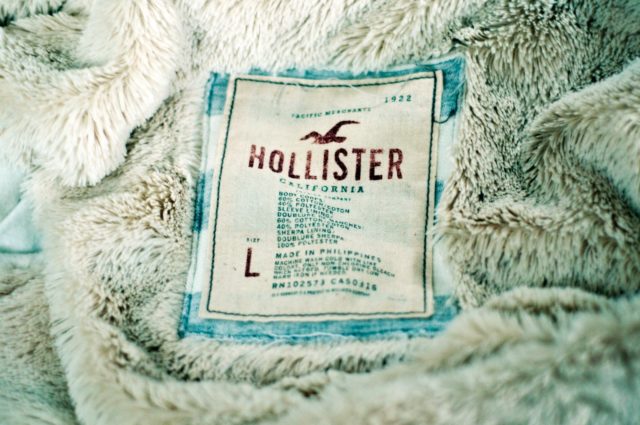 a label on a hollister jacket with a bird on it